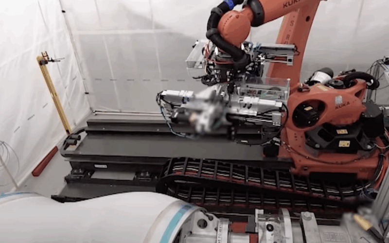 A robotic system completes a composite layup